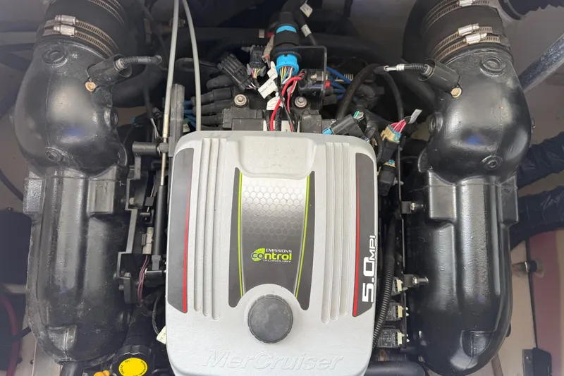 Slide: The Image of Engine of a 2014 Hurricane SunDeck Sport 202 IO boat, featuring MerCruiser 5.0 MPI. - 29