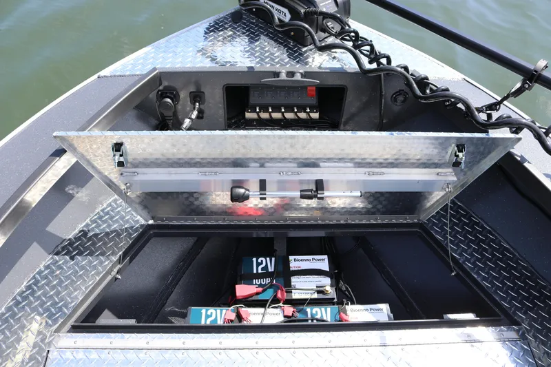 Slide: The Image of 2026 Alumaweld Pacific CC 26 boat battery compartment with Bioenno Power batteries and wiring. - 22