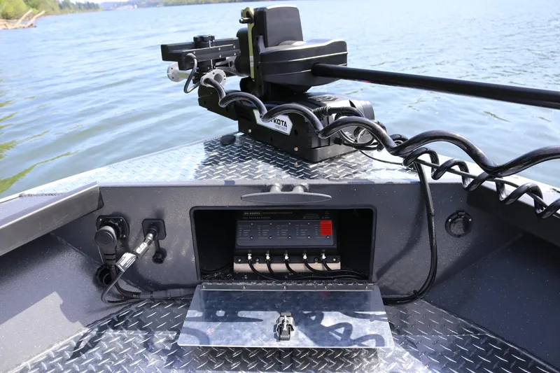 Slide: The Image of Alumaweld Pacific CC 26 boat dashboard with control panel and motor, 2026 model. - 21
