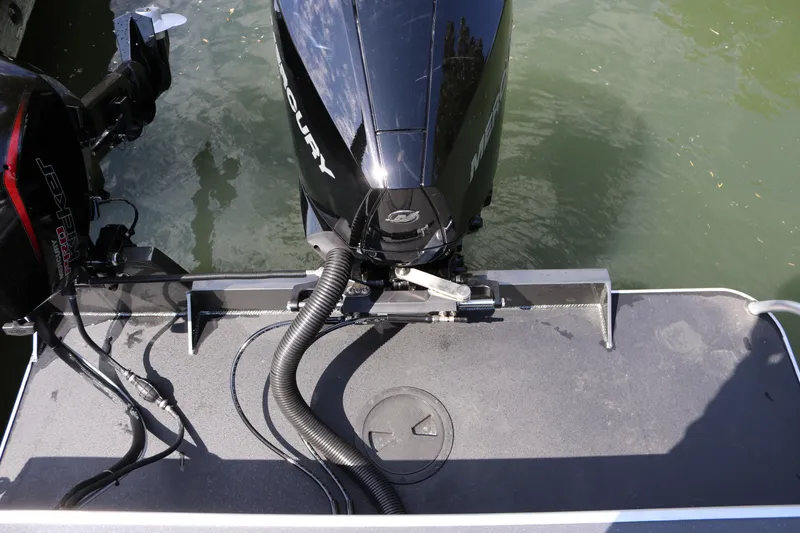 Slide: The Image of 2026 Alumaweld Pacific CC 26 boat with Mercury outboard motor on water. - 31