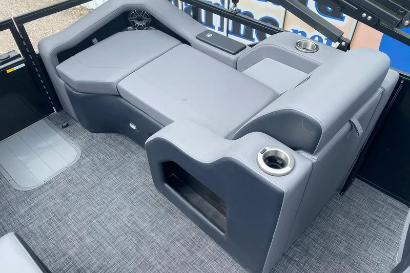 Slide: The Image of Luxurious seating area on 2026 SunCatcher Elite 324 SS boat with cup holders. - 11