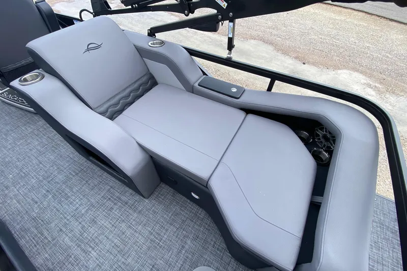 Slide: The Image of Luxurious seating on 2026 SunCatcher Elite 324 SS boat with cup holders and sleek design. - 12