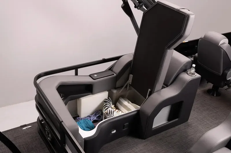 Slide: The Image of Manufacturer Provided Image: 2026 SunCatcher Elite 324 SS boat interior storage compartment with open seat and accessories. - 18