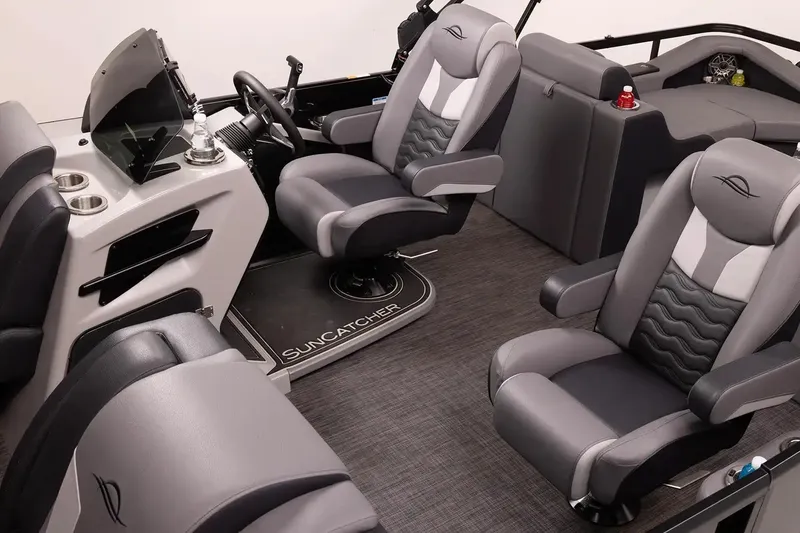 Slide: The Image of Manufacturer Provided Image: Interior of 2026 SunCatcher Elite 324 SS boat with luxurious seating and modern dashboard. - 19