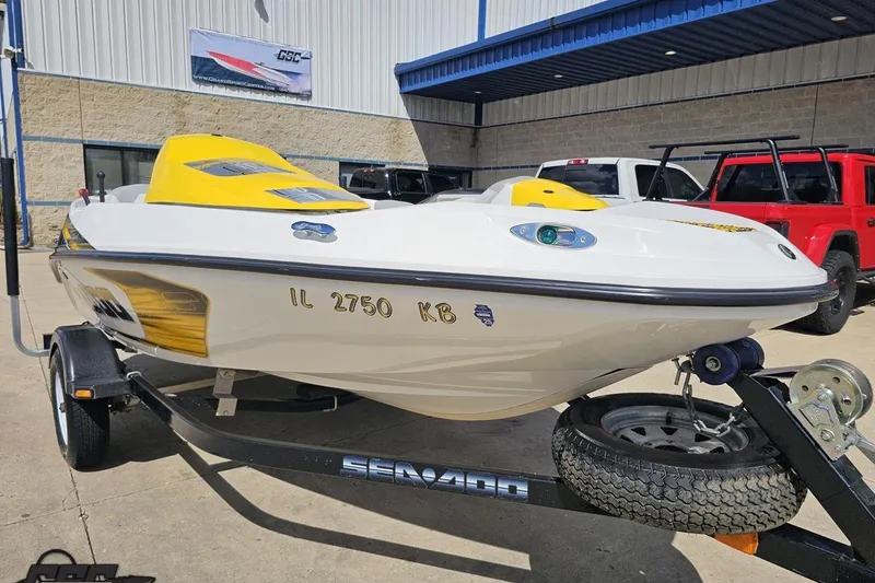 Slide: The Image of 2007 Sea-Doo Sport Boats 150 Speedster on trailer, parked outside a building. - 13