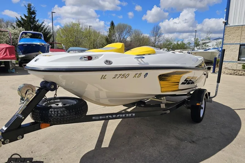 Slide: The Image of 2007 Sea-Doo Sport Boats 150 Speedster on trailer, sunny day, outdoor setting. - 20
