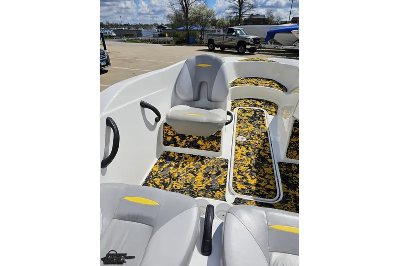 Slide: The Image of 2007 Sea-Doo 150 Speedster interior with patterned flooring and gray seating. - 53