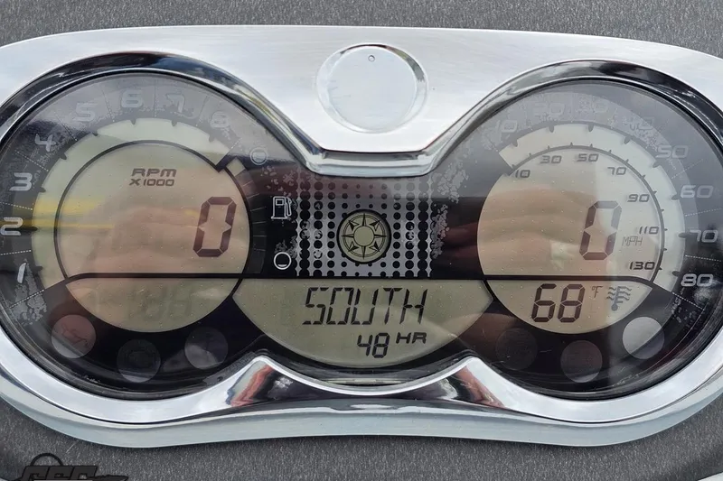 Slide: The Image of Dashboard of a 2007 Sea-Doo 150 Speedster showing RPM, speed, and temperature. - 60