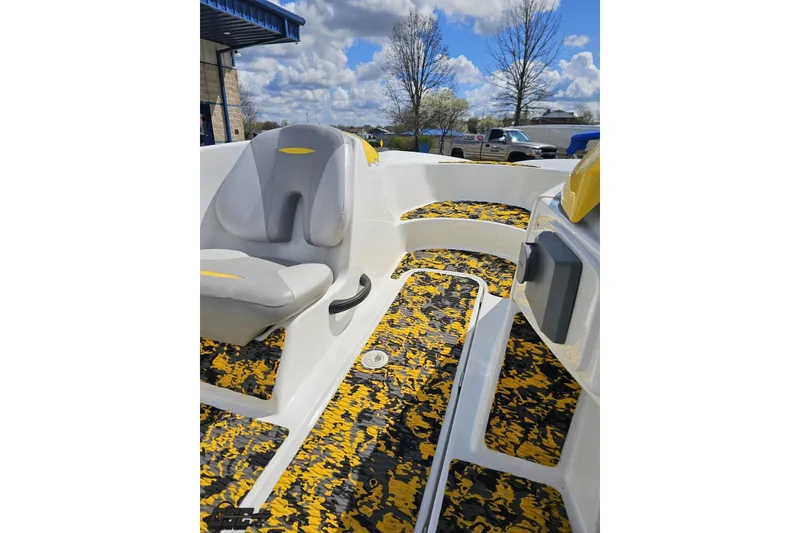 Slide: The Image of 2007 Sea-Doo 150 Speedster interior with yellow and black patterned flooring. - 65