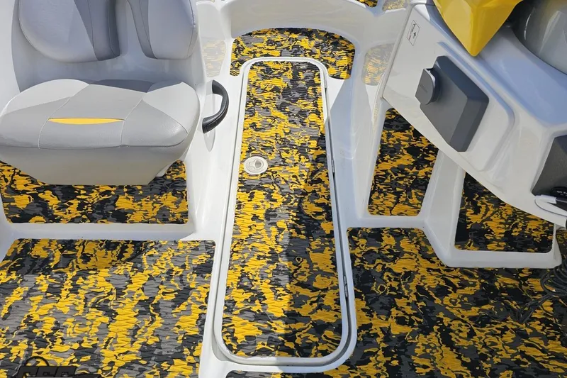 Slide: The Image of 2007 Sea-Doo 150 Speedster interior with vibrant yellow and black flooring. - 67