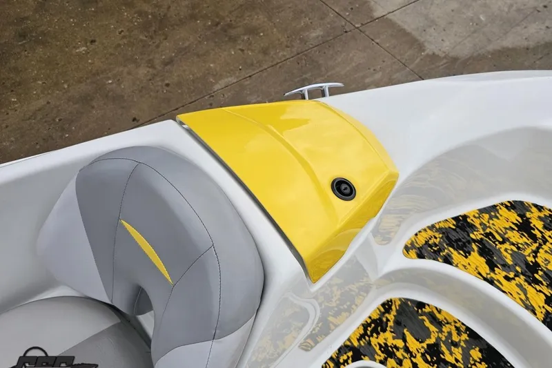 Slide: The Image of 2007 Sea-Doo 150 Speedster boat interior with yellow and gray accents. - 73