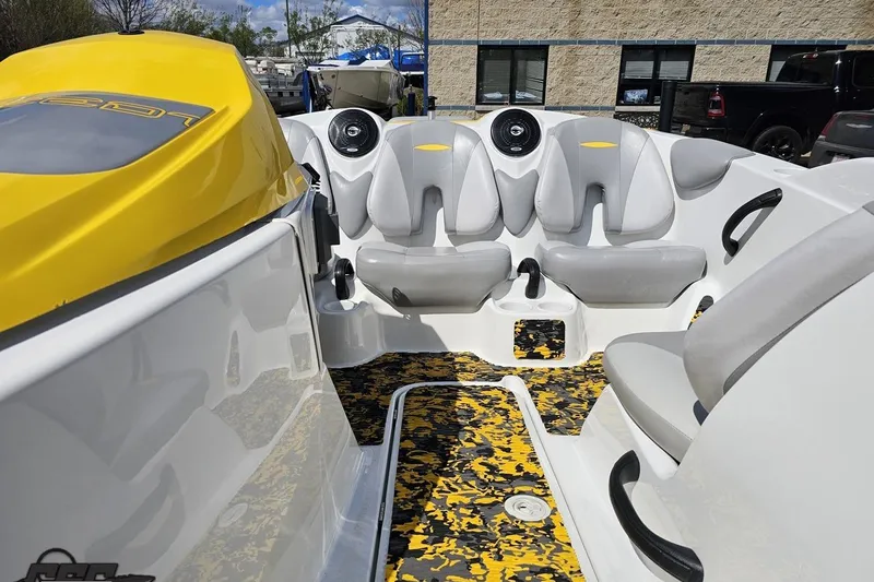Slide: The Image of 2007 Sea-Doo 150 Speedster interior with yellow accents and seating arrangement. - 75