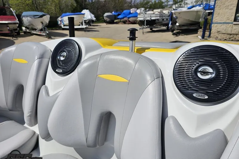 Slide: The Image of 2007 Sea-Doo 150 Speedster interior with gray seats and Clarion speakers. - 80