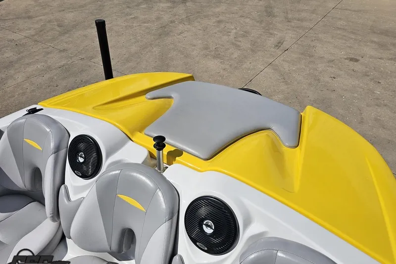 Slide: The Image of 2007 Sea-Doo 150 Speedster boat interior with yellow and gray seating. - 81