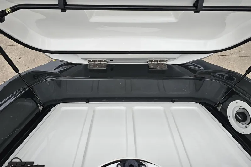 Slide: The Image of Open storage compartment of 2007 Sea-Doo 150 Speedster boat, showcasing interior details. - 84