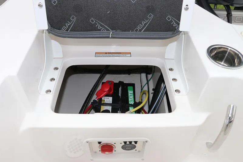 Slide: The Image of Battery compartment of 2026 Robalo 206 Cayman boat, featuring wiring and storage space. - 13