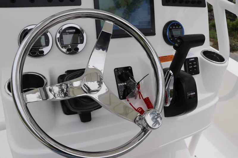 Slide: The Image of Steering console of 2026 Robalo 206 Cayman boat with Yamaha controls and gauges. - 19