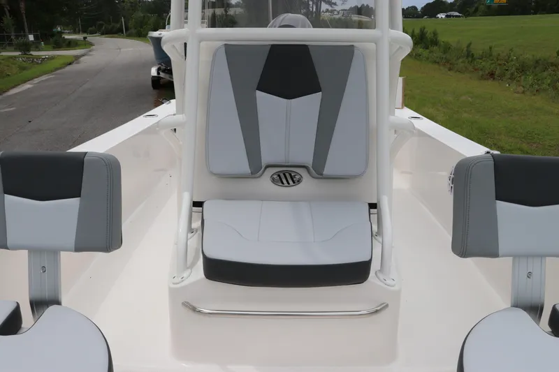 Slide: The Image of 2026 Robalo 206 Cayman boat interior with gray and white seating. - 23