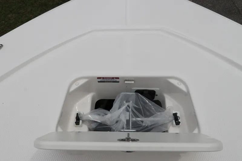 Slide: The Image of Anchor storage compartment on 2026 Robalo 206 Cayman boat deck. - 30