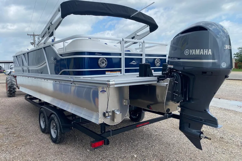 Slide: The Image of 2026 SunCatcher Elite 326 SS pontoon boat with Yamaha 300 outboard motor on trailer. - 4