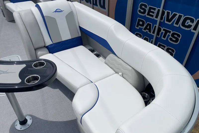 Slide: The Image of Luxurious seating on 2026 SunCatcher Elite 326 SS boat with cup holders and sleek design. - 8