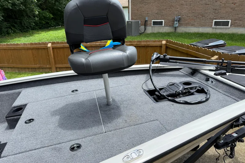 Slide: The Image of 2024 Bass Tracker Pro 17 boat with a swivel seat and trolling motor on deck. - 5