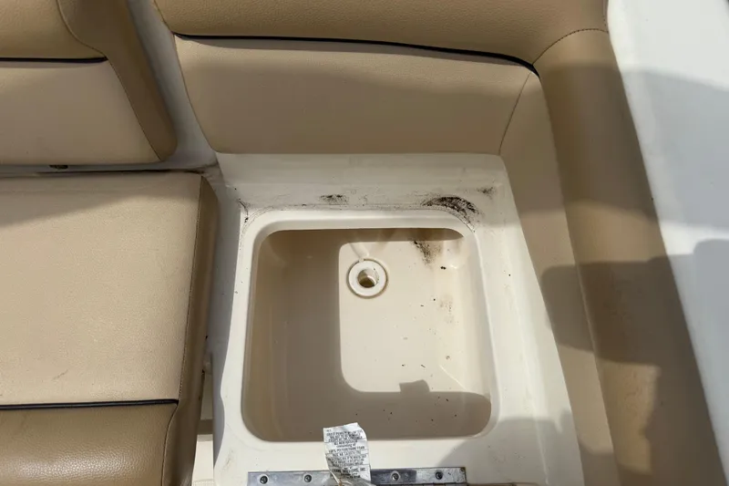 Slide: The Image of Interior view of a 2017 Scout 210 Dorado boat seat compartment. - 12