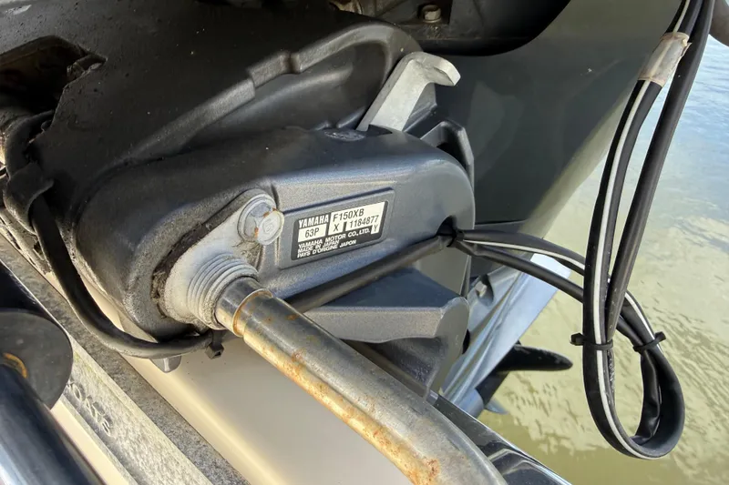 Slide: The Image of Close-up of Yamaha motor part on 2017 Scout 210 Dorado boat. - 14