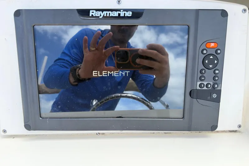 Slide: The Image of Raymarine Element display on 2017 Scout 210 Dorado boat, reflecting person taking photo. - 23