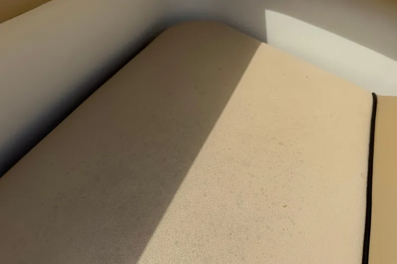 Slide: The Image of Beige seat cushion on 2017 Scout 210 Dorado boat, partially shadowed. - 39