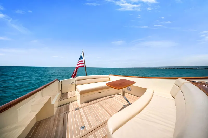 Slide: The Image of Hinckley Picnic Boat 40, 2020 model, with elegant seating and ocean view. - 2