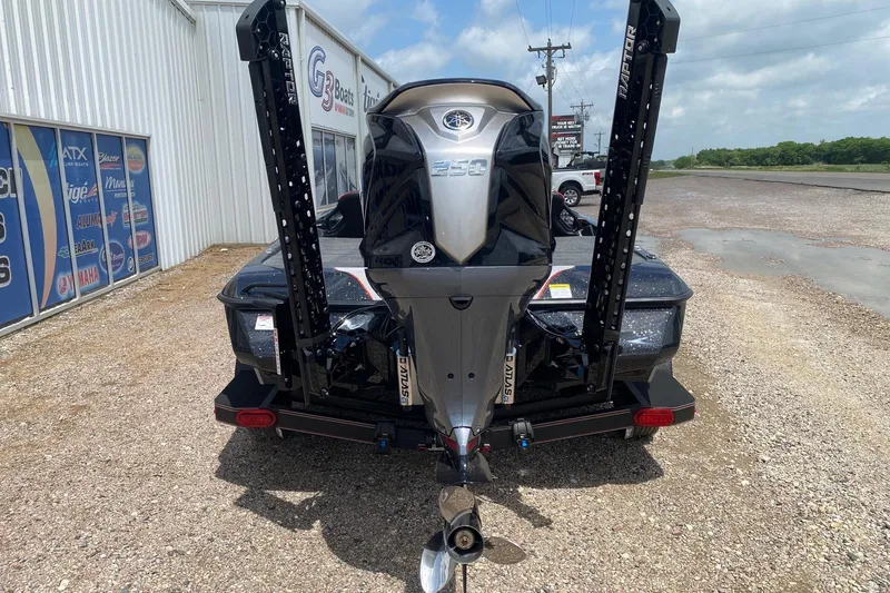 Slide: The Image of Rear view of 2026 Skeeter ZXE20 boat with powerful outboard motor. - 5