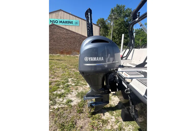 Slide: The Image of 2023 Starcraft SVX 191 OB boat with Yamaha outboard motor at dealership. - 12