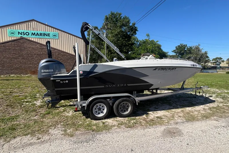Slide: The Image of 2023 Starcraft SVX 191 OB boat on trailer at NSO Marine dealership. - 19