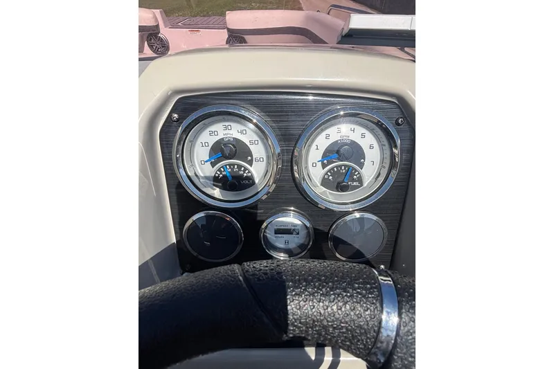 Slide: The Image of Dashboard of 2023 Starcraft SVX 191 OB boat with speedometer and fuel gauge. - 3
