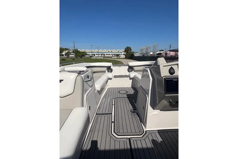 Slide: The Image of 2023 Starcraft SVX 191 OB boat interior with sleek seating and modern dashboard. - 5