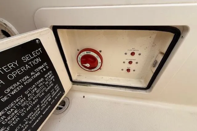 Slide: The Image of Battery control panel on a 2015 Grady-White Freedom 225 boat. - 32