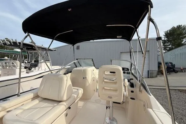 Slide: The Image of 2015 Grady-White Freedom 225 boat interior with seating and canopy. - 37