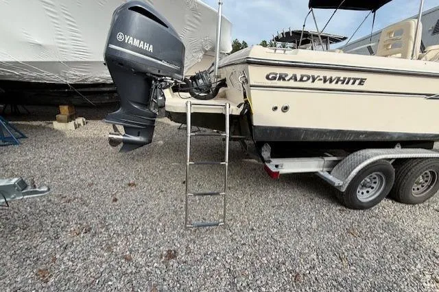 Slide: The Image of 2015 Grady-White Freedom 225 boat with Yamaha outboard motor on trailer. - 41
