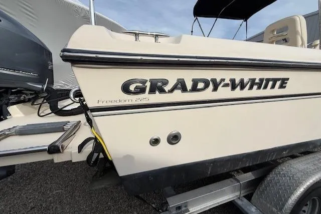 Slide: The Image of 2015 Grady-White Freedom 225 boat on trailer, side view. - 43