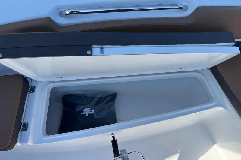Slide: The Image of Open storage compartment in 2026 Sea Pro 202 Center Console boat. - 12