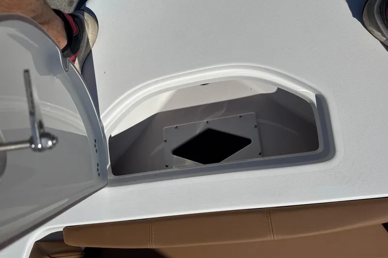 Slide: The Image of Open storage compartment on 2026 Sea Pro 202 Center Console boat deck. - 13