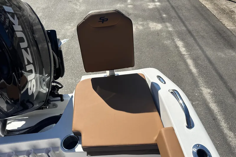 Slide: The Image of 2026 Sea Pro 202 Center Console boat with Suzuki engine and tan seating. - 17