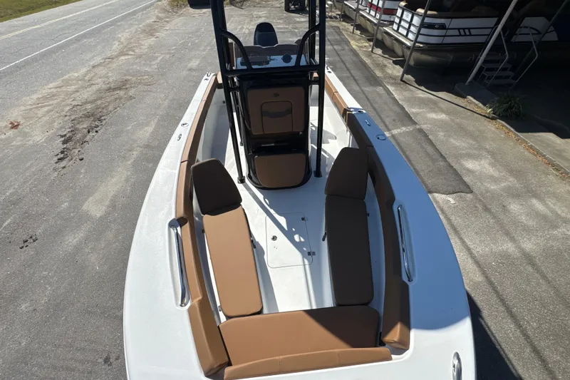 Slide: The Image of 2026 Sea Pro 202 Center Console boat with brown seating, viewed from above. - 8
