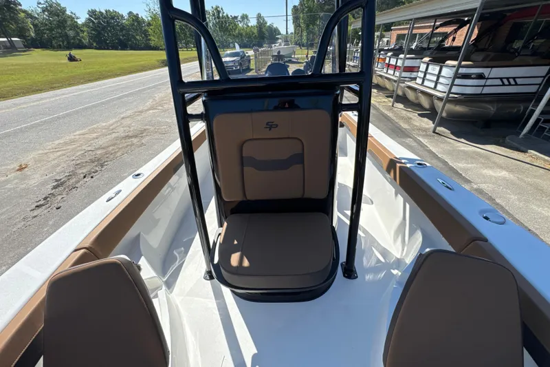 Slide: The Image of 2026 Sea Pro 202 Center Console boat interior with seating and console view. - 9