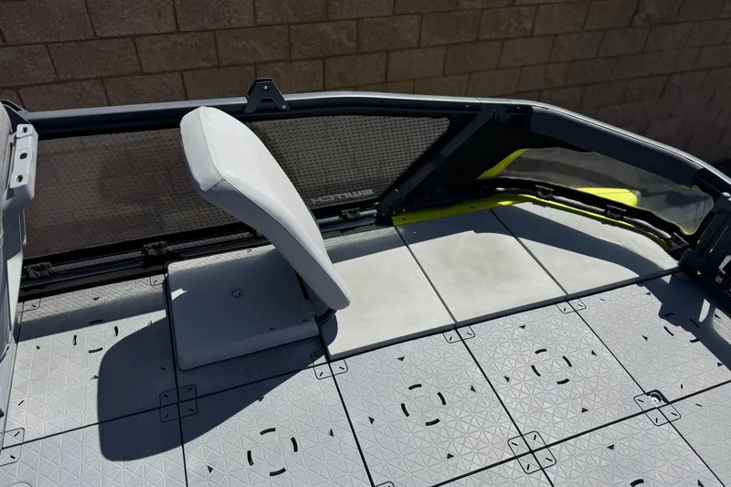 Slide: The Image of 2022 Sea-Doo Switch Sport 21 deck with modular seating and textured flooring. - 11