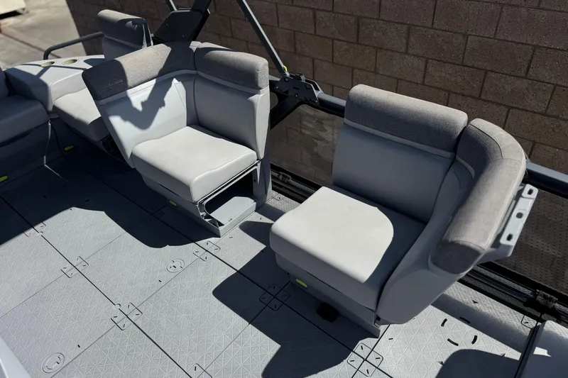 Slide: The Image of 2022 Sea-Doo Switch Sport 21 interior seating with gray upholstery and modular design. - 14