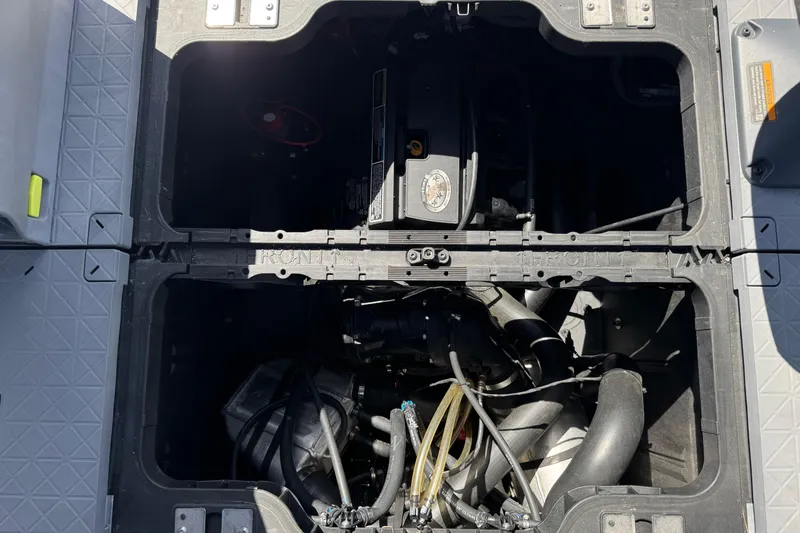 Slide: The Image of Engine compartment of 2022 Sea-Doo Switch Sport 21, showcasing internal components. - 19