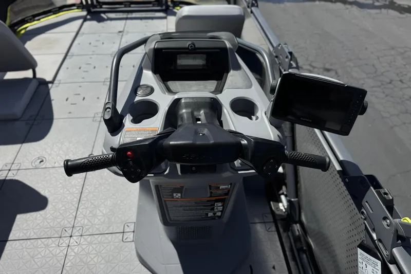 Slide: The Image of 2022 Sea-Doo Switch Sport 21 dashboard with steering and navigation controls. - 21