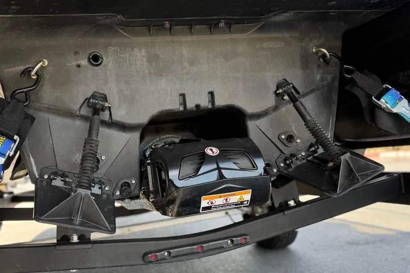 Slide: The Image of Underneath view of a 2022 Sea-Doo Switch Sport 21, showcasing its mechanical components. - 8